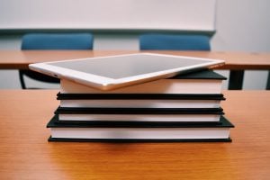 tablet and books