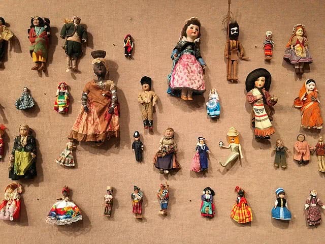 A bunch of hanging dolls in doll exhibit main library.