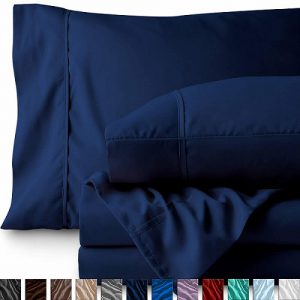Navy colored bed sheets by Bare Home. Linked to its Amazon page.